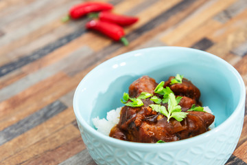 Asian style caramel pork with rice and vegetable