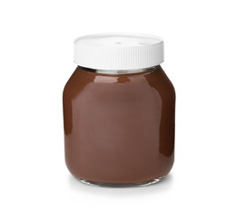 Glass jar with tasty chocolate cream isolated on white