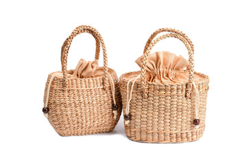 Fototapeta na wymiar women fashion handbag with Woven or straw bag handmade bag Thai handicraft weave from natural materials, For caring environment reduce the use of plastic bags