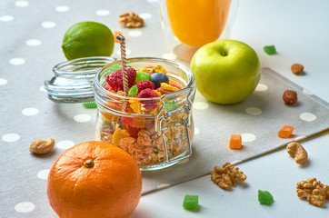 Healthy breakfast with muesli, milk, yogurt, fruit
