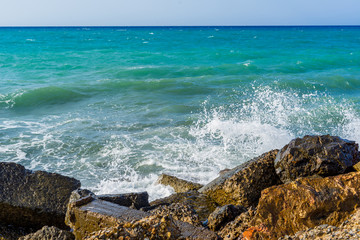 High wave splashing on the cliff