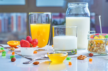 Healthy breakfast with muesli, milk, yogurt, fruit