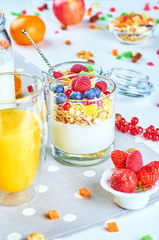 Healthy breakfast with muesli, milk, yogurt, fruit