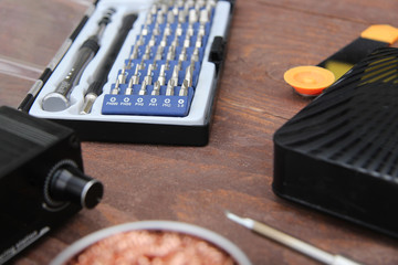 electronics repair equipment and tools on the table