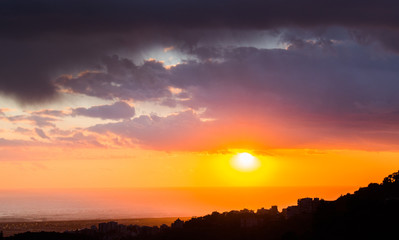 This is a capture of a sunset in Beirut and you can see the orange color formed by the sun and the beautiful horizon
