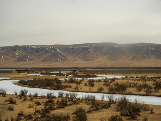 Car window scenery of Qinghai–Tibet railway in Tibet Autonomous Region, China.
