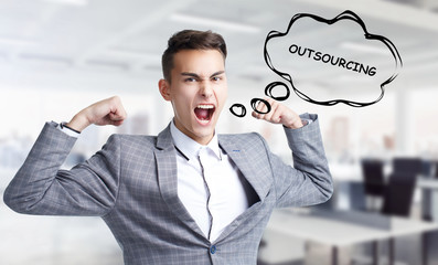 Business, technology, internet and networking concept. Young entrepreneur shouts out a keyword: Outsourcing