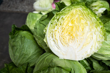 Obraz premium sliced cabbage at traditional marketplace