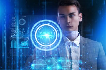 The concept of business, technology, the Internet and the network. A young entrepreneur working on a virtual screen of the future and sees the inscription: Online training