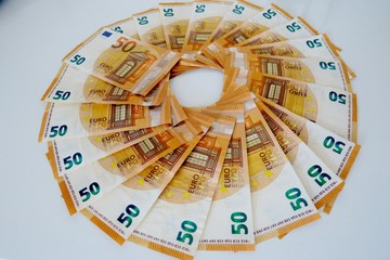  fifty euro banknotes on a white background close-up