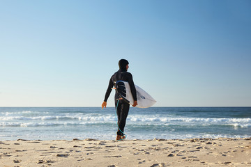 surfer on shore