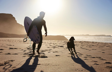 surfer with dog