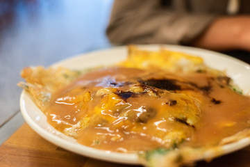 at traditional Taiwanese snack of oyster omelet