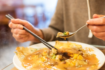 at traditional Taiwanese snack of oyster omelet