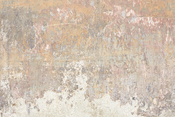 Old chipped and faded wall texture background