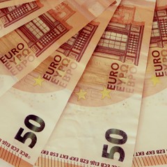 Fifty euro banknotes on a white background close-up.