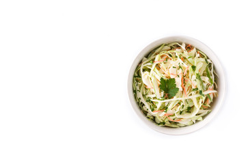 Coleslaw salad in white bowl isolated on white background. Top view. Copyspace