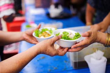 Feeding the hungry to get a taste for the poor Make humanitarian society : concept social...