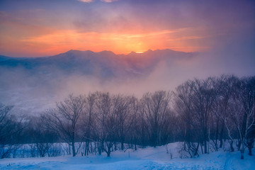 Sunset view on the top of Moiwa mountain in winter snow