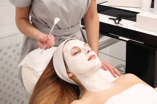 facial treatment of young woman