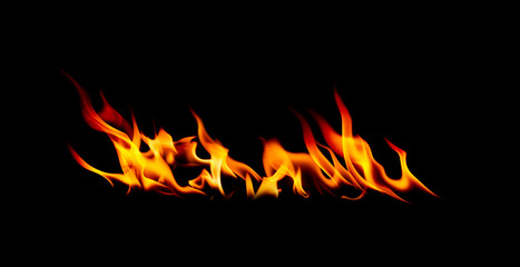 Fire flames isolated on black background.