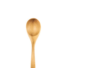 Empty wooden spoons isolated on white background, close up