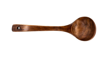 Empty wooden spoons isolated on white background, close up