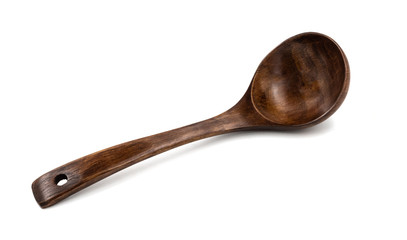 Empty wooden spoons isolated on white background, close up