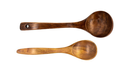 Empty wooden spoons isolated on white background, close up