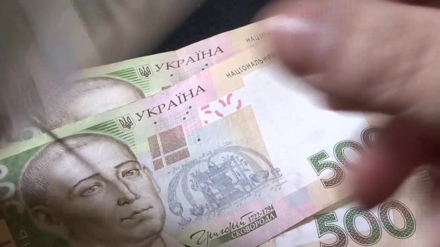 500 hryvnia - banknotes of Ukraine in male hands