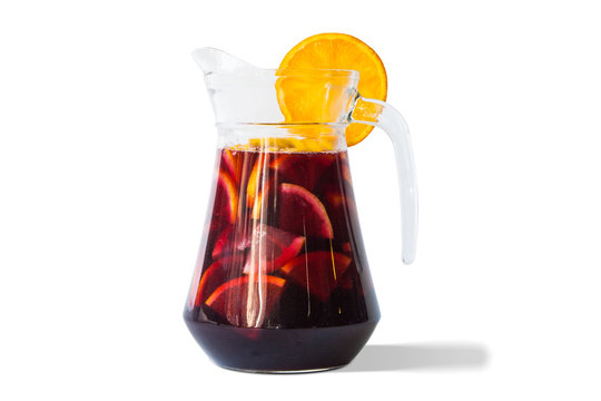 Refreshing sangria fruit punch beverage in glass pitcher