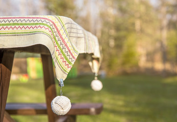 Clip tablecloth weights attached to a table cloth outdoors these are designed to hold your table...