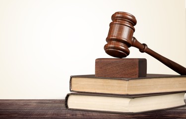 Justice Scales and books and wooden gavel on table. Justice concept
