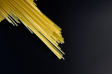 Spaghetti on a black background