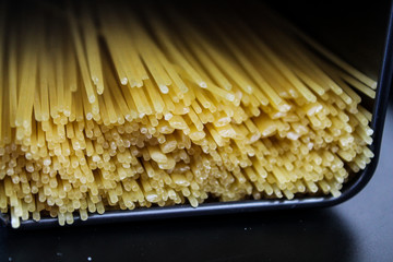 Spaghetti on a black background