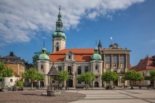 Church and town hall in Pszczyna, Silesia, Poland