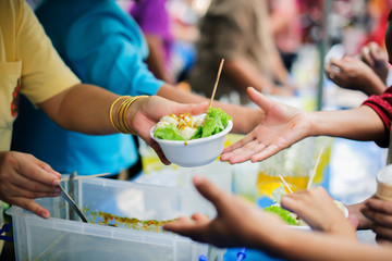Charity food is the hope of the poor who have no money : concept of begging food : Donate food to...
