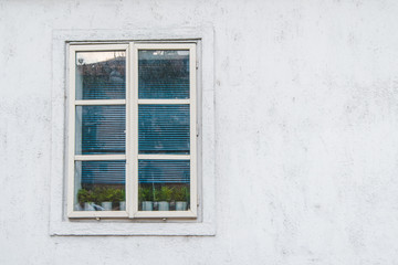 Obraz na płótnie Canvas white window on gray wall