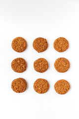 pattern with oat cookies on white background, food for the diet, bakery food