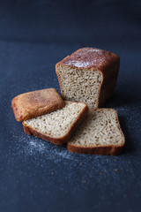 Bread, bakery icon, sliced fresh wheat bread isolated on white background, tasty bread on black background