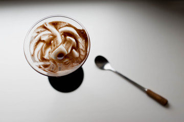 an empty glass of dessert