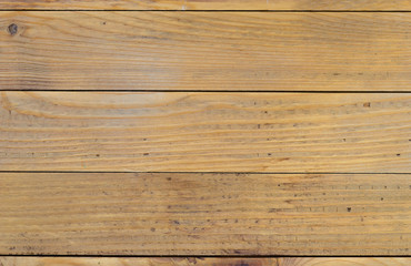 Fototapeta na wymiar Texture of unpainted wooden planks as background, top view