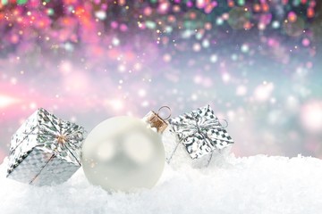 Christmas balls in snowflakes on background