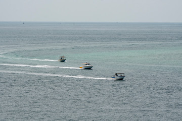 Small speed boat Compete for time to get people across the sea.