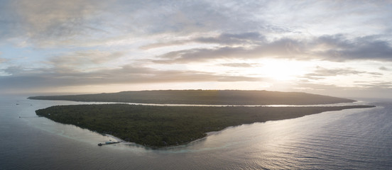 An idyllic tropical resort is found on a remote island in the Wakatobi National Park, Indonesia. This region is known for its incredible coral reefs and high marine biodiversity.