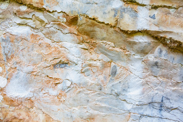 Closeup - beautiful structure of an ancient rock texture formation. Concept of natural background...