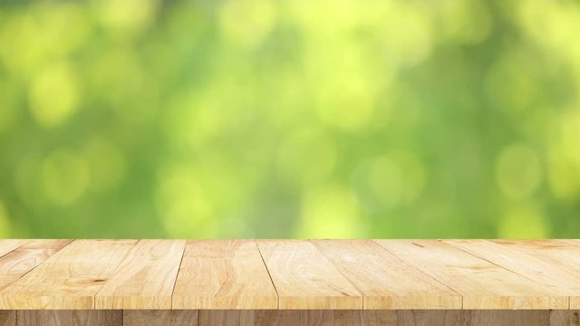 4K table display product and natural green blurlight background