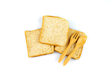 sliced bread and spoons isolated on white backgroun isolated on white backgroun
