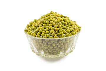 Isolated object of dried mung beans in a glass cup