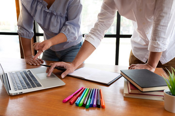 Group of young people learning studying lesson in library during helping teaching friend education prepare for exam, youth campus friendship teenager teens concept